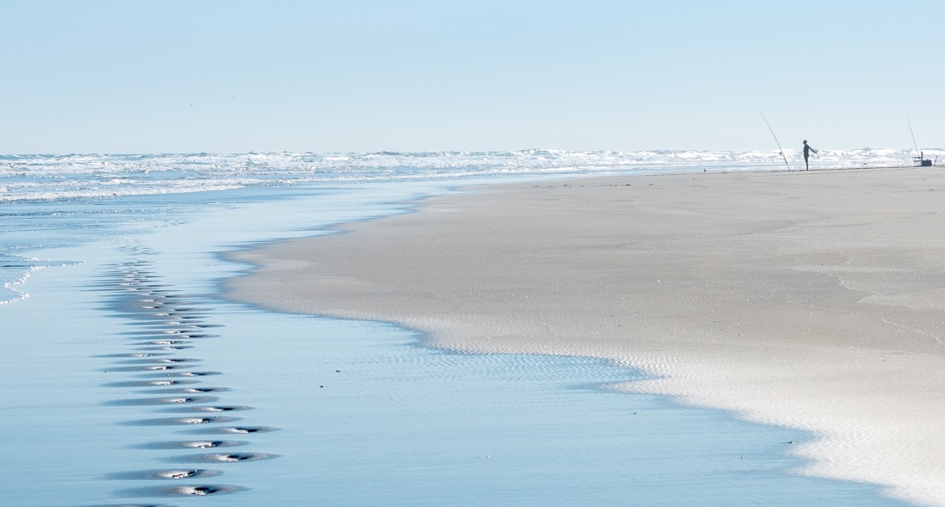 Footprints along beach